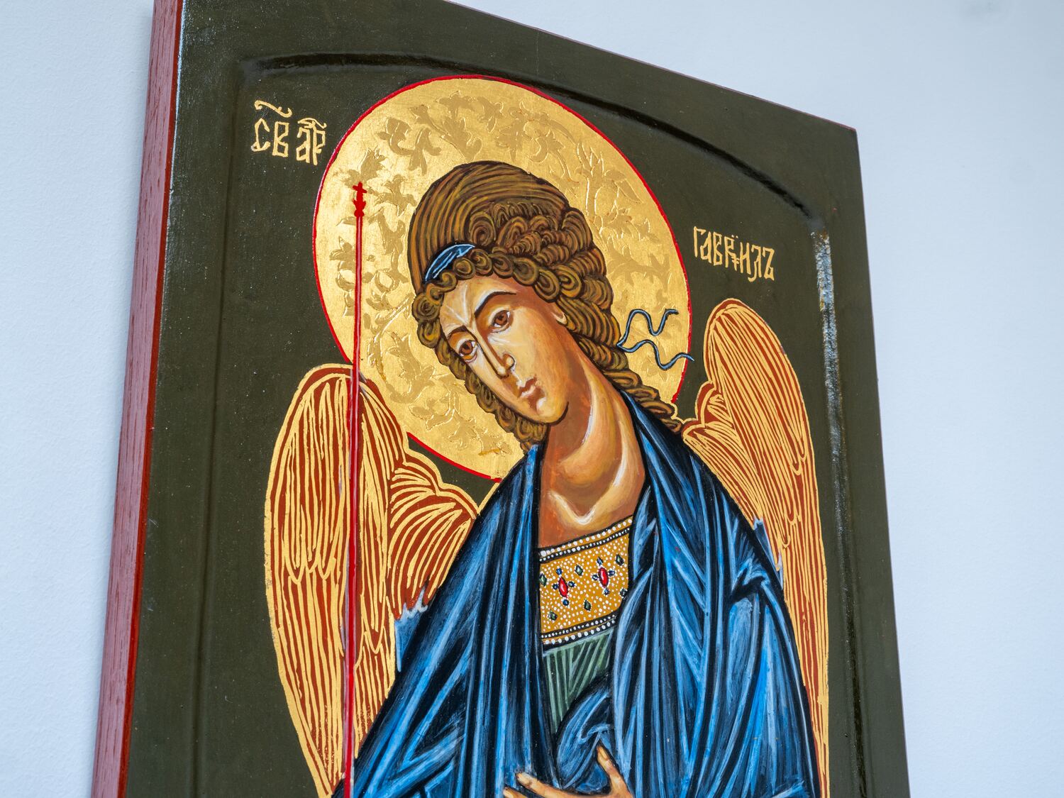 The Archangel Gabriel icon seen at an angle, showing the gilded halo